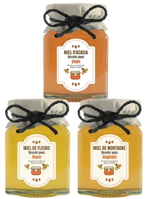 Pots de miel avec étiquettes personnalisées pour illustrer la personnalisation produit